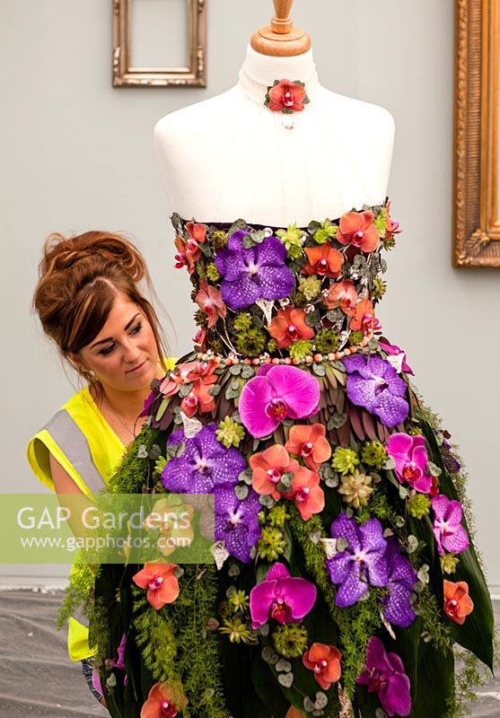 British Floristy Association Young Florist of the Year in the Brand Pavilion: Dress made of flowers under construction. 2014 RHS Chelsea Flower Show