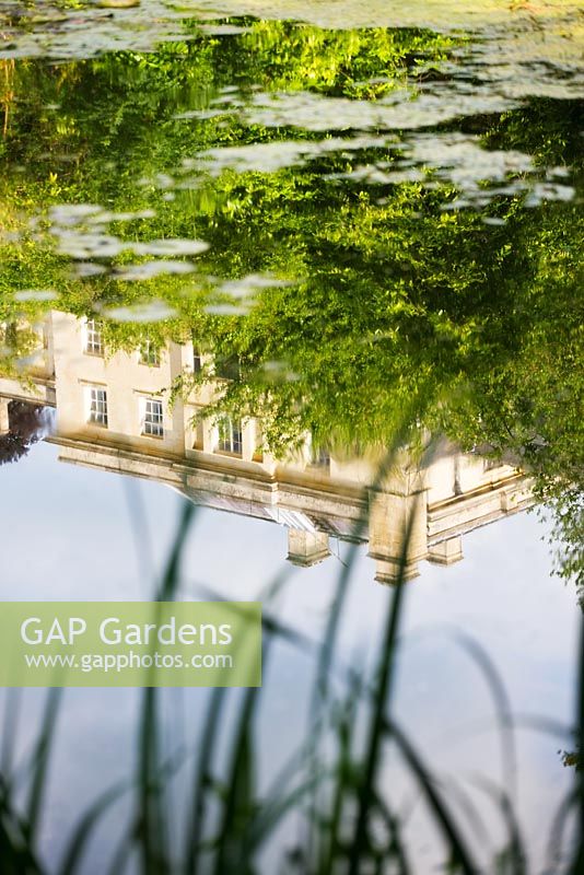 Reflection of the house in the pool. Painswick Rococo Garden, Gloucestershire 