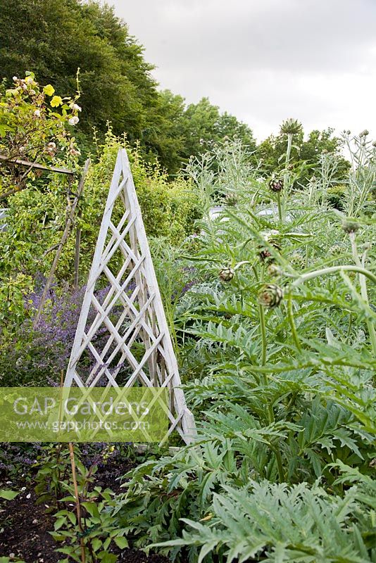 Decorative wooden obelisk in Kitchen Garden. Chenies Manor, Buckinghamshire