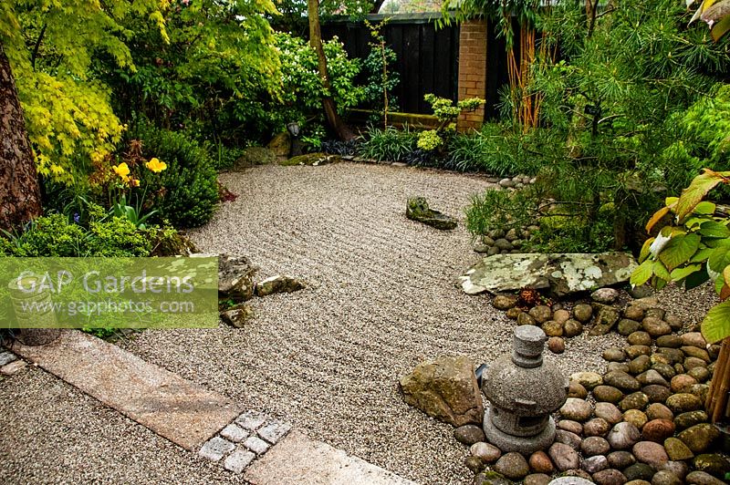 Japanese style landscaped garden, with a dry waterfall running into a gravel sea. Westgate villas, Shropshire