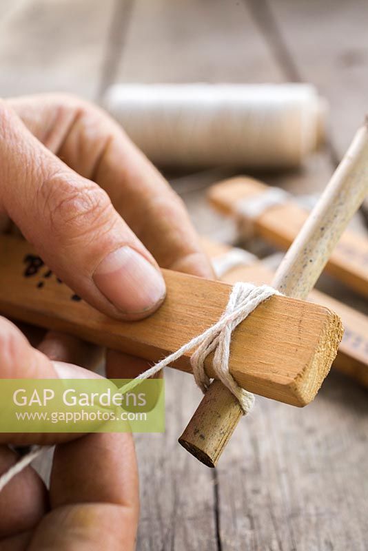 Using small blocks of wood, small parts of a garden cane and string to create trendy plant labels. 