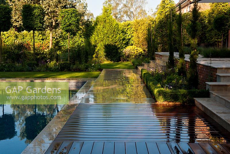 Modern garden with pool and decking