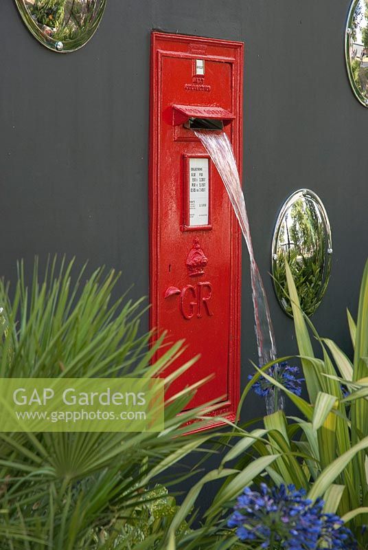 Red post box water feature