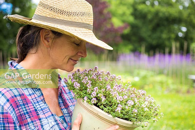 Woman smelling Thyme