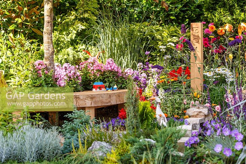 1970s period planting and children's toys from the era - The NSPCC Legacy Garden, RHS Hampton Court Flower Show 2014