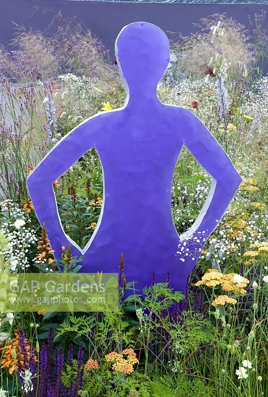 The Stonewall Garden: Breaking Down the Walls of Pride. Conceptual garden Purple cut-out of a female figure surrounded by soft perennial planting. Designer: Amanda Miller Gold award 