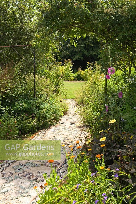 The Mosaic Path. Hall Farm Garden at Harpswell near Gainsborough in Lincolnshire. July 2014.
