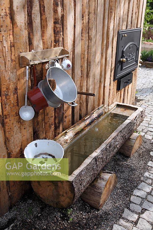 Wooden fountain in alpine style with washbowl, Sigmaringen, Germany