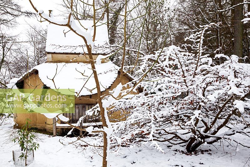 The Sanctuary covered in snow. Highgrove Garden, January 2013. It was built in 1999 to mark the Millennium and is a place of contemplation. Devised by Professor Keith Critchlow of the Prince's school of Tradtional Arts and Crafts and created from a design by Charles Morris. It is made entirely of natural materials.