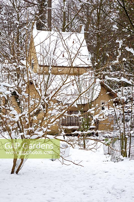 The Sanctuary covered in snow. Highgrove Garden, January 2013. It was built in 1999 to mark the Millennium and is a place of contemplation. Devised by Professor Keith Critchlow of the Prince's school of Traditional Arts and Crafts and created from a design by Charles Morris. It is made entirely of natural materials.
