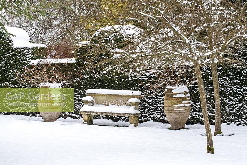 Stone seat and pots, Highgrove Garden in snow,  January 2013