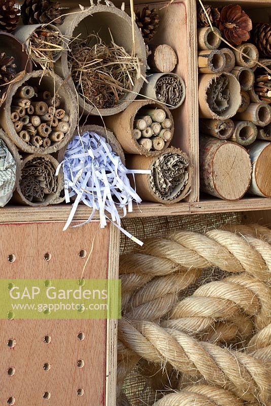 A mixture of natural and man-made materials combining in compartments to make an insect box and wildlife haven