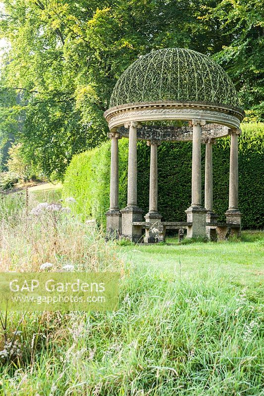 Ionic Tempietto, a small circular temple, at the head of the Long Pond, contains a small circular pond. Forde Abbey, nr Chard, Dorset, UK