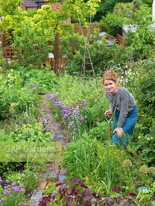 Alys Fowler, gardener, author and TV presenter, works in her 18m x 6m back garden where she grows a mix of fruit, herbs, decorative flowers and vegetables in packed borders.