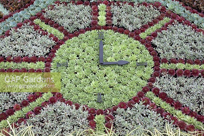 Stamp of Approval, Beautiful Borders at BBC Gardener's World Live 2014, featuring traditional geometric carpet bedding display celebrating the riches of Birmingham's historic and globally significant Jewellery Quarter 