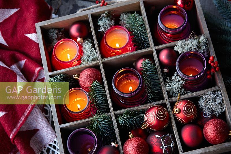 Winter display with candles and baubles