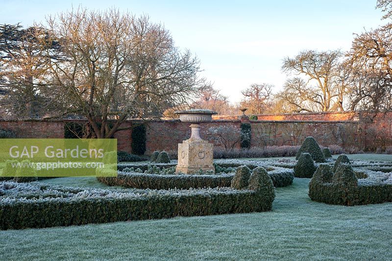Frosty formal knot parterre with urn