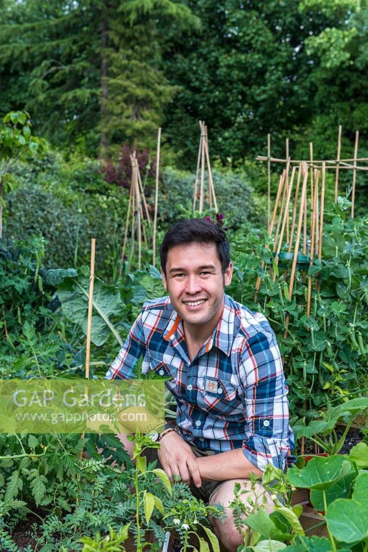 James  Wong, ethnobotanist, TV presenter, author and celebrity gardener, in his own small vegetable patch where he experiments with unusual edible plants.