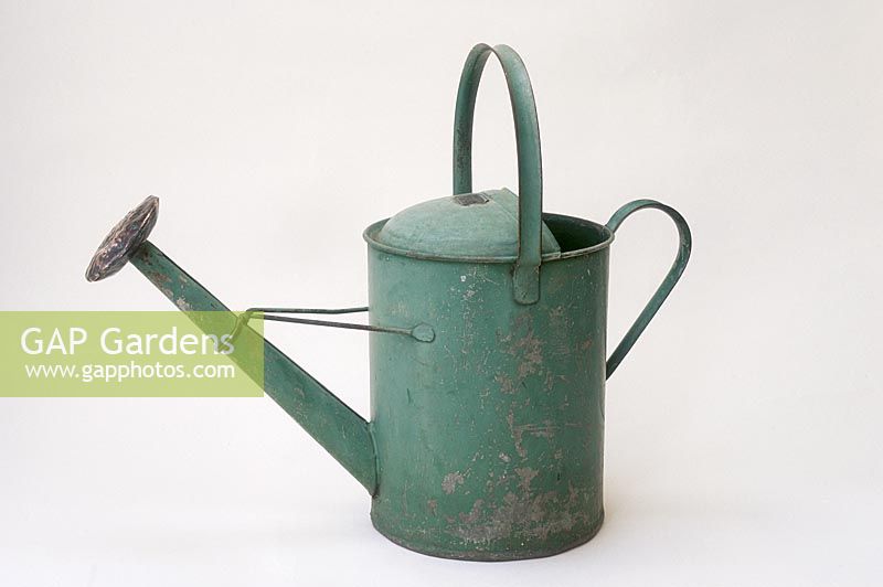 2.5 gallon watering can on white background