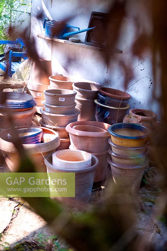 Terracotta pots, stacked in a group