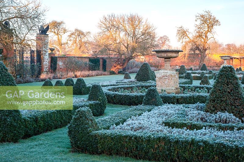Formal box parterre with frost at Helmingham Hall, Suffolk