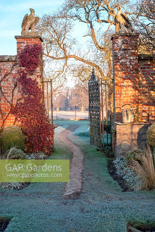 Gates opening up to parkland at Helmingham Hall, Suffolk