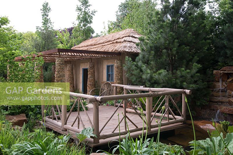 Basotho style building with wooden balcony - The Sentebale Garden, RHS Chelsea Flower Show 2015 