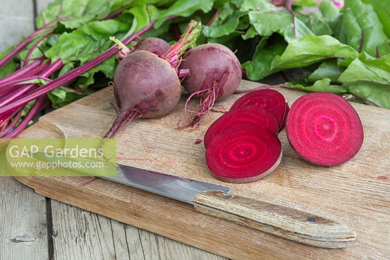 Beetroot 'Detroit Dark Red' sliced on a chopping board