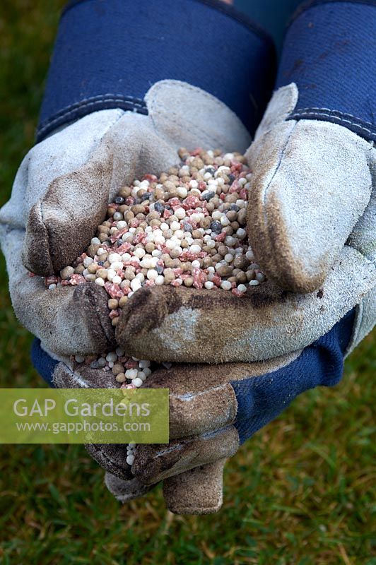 Wear gloves when handling garden fertiliser