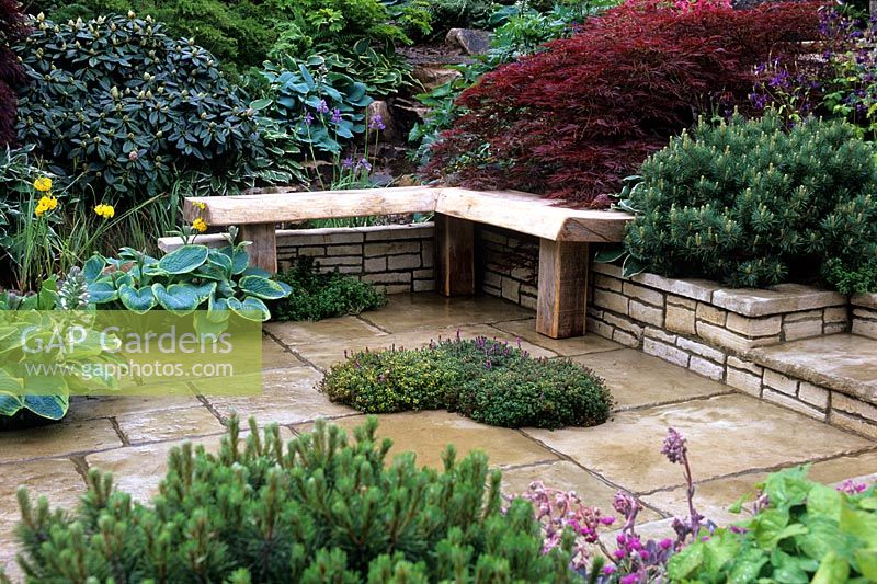 Stone terrace, simple wooden seat