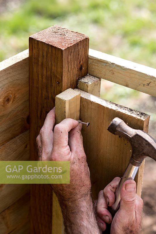 Building wooden compost bin, step by step. adding baton support