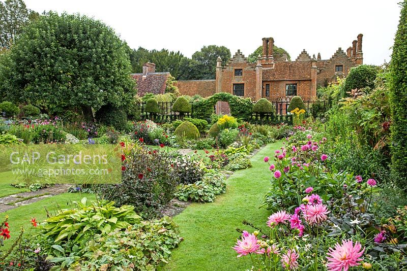 Chenies Manor Gardens - Showing the Sunken Garden double borders with Dahlia and perennials