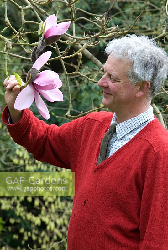 Rupert Eley with a Magnolia flower at The Place For Plants, April. 