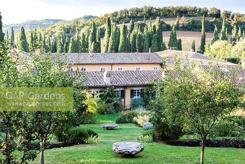 The Fattoria, Villa La Foce, near Chianciano Terme, Siena, Tuscany, Italy. October. Iris and Antonio Origo commissioned English architect Cecil Pinsent to design the garden which was built between 1927 and 1939 in the Renaissance Revival style.  
