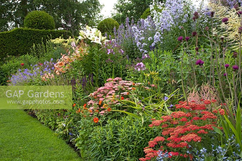 Colourful flower border at Felley Priory, Underwood, Nottingham in July.