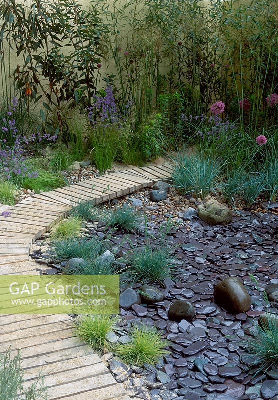 Timber path running through slate garden planted, Chelsea Flower Show 2003