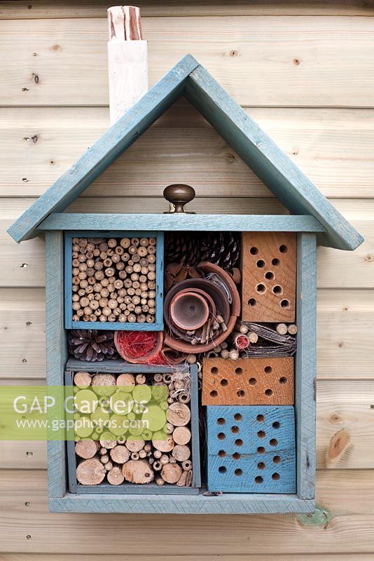 Blue insect hotel in 'It Makes Sense' Garden at RHS Tatton Flower Show 2015