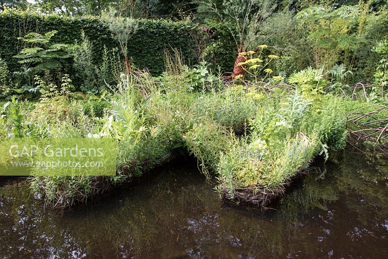 Floating garden with wicker baskets - Que Vienne La Pluie, When the Rains Come, Designer: Frederique Larinier, Festival International des Jardins 2016, Domaine de Chaumont sur Loire, France