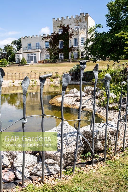 Unusual garden fence created by Paul Gilbert, blacksmith and sculptor

