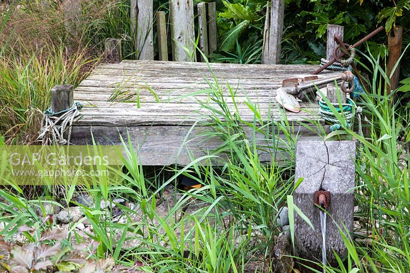 Little jetty built from old mushroom planting crates. The wood and ropes and anchor are from various beach-combing expeditions.