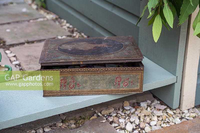 Vintage tin box containing packets of seeds