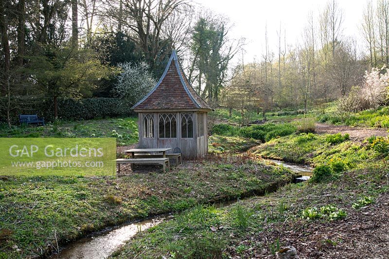 Stream next to Summerhouse with picnic table and benches