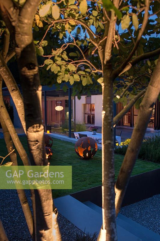 Garden by night with deco elements   