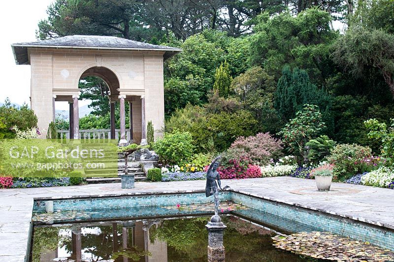 The temple and formal pool in the Italian garden of Ilnacullin - Garinish Island. Glengarriff, West Cork, Ireland. The Gardens are the result of the creative partnership of Annan Bryce and Harold Peto, architect and garden designer. August