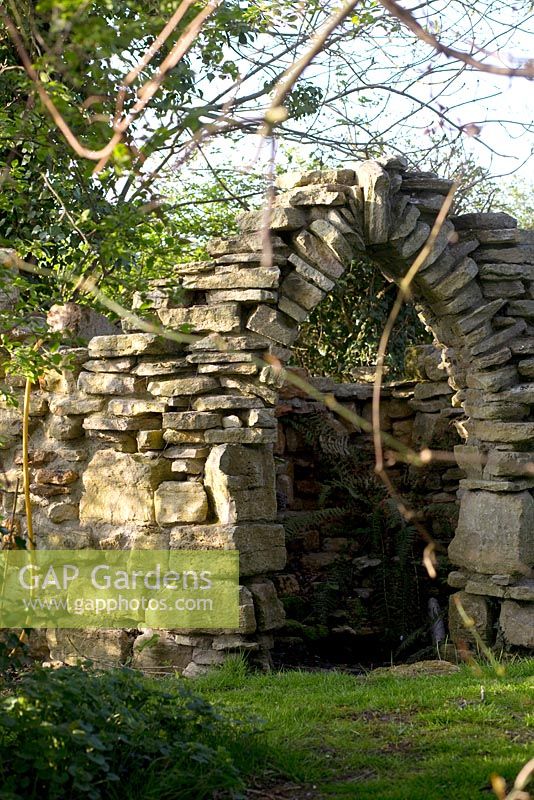 The outside of the folly in the woodland garden