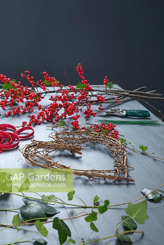 Materials required to make wreath are ribbon, stub wire, Ivy, Ilex aquifolium and a wreath frame