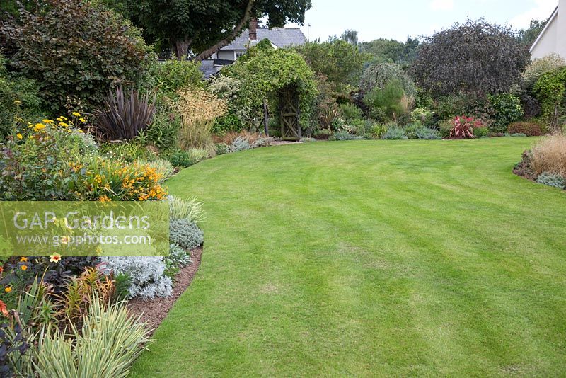 Overview of garden with curved borders