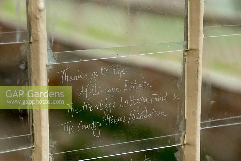 Etched glass pane in the restored greenhouse