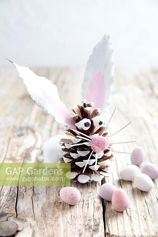 Easter bunny made from a pine cone, leaves and fir tree whiskers.