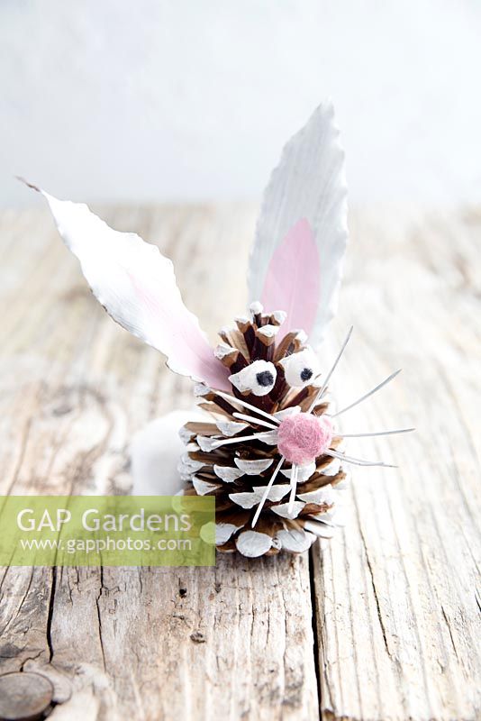 Easter bunny made from a pine cone, leaves and fir tree whiskers.
